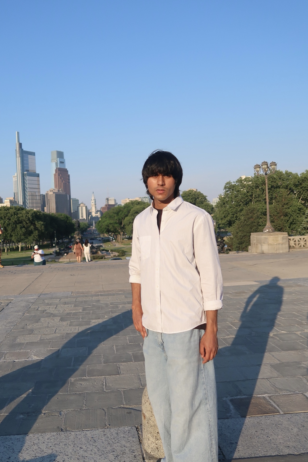 Arshroop Saini with the city skyline behind