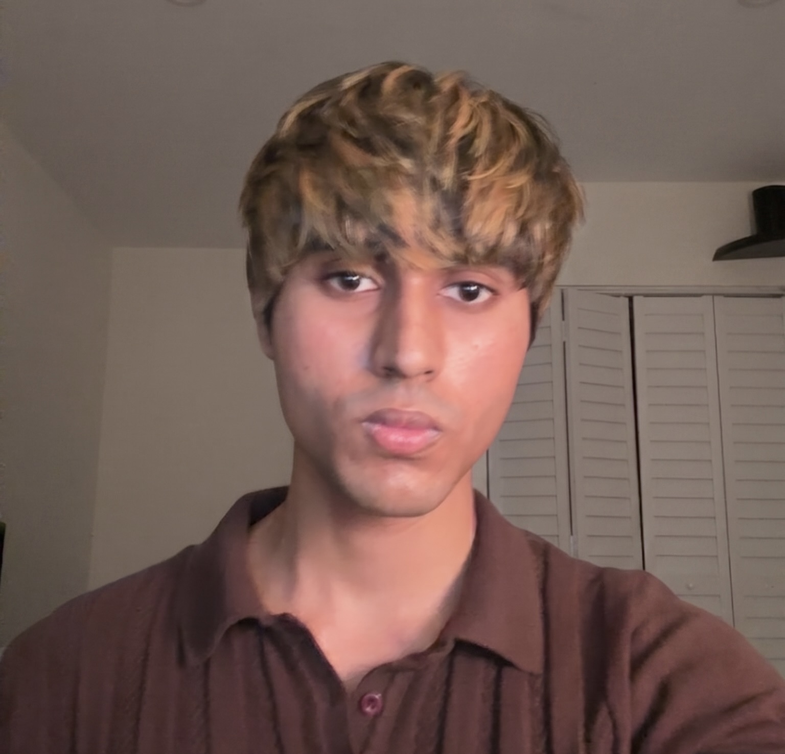 Arshroop Saini portrait with bleached blonde hair